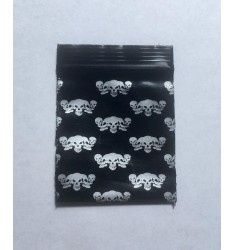 100 Bustine di plastica nera disegno Teschio 25x25 mm